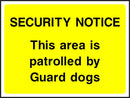 Security Notice Sign: Guard Dogs Patrolling